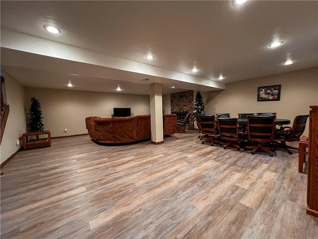 interior space with light wood-style flooring, recessed lighting, and baseboards