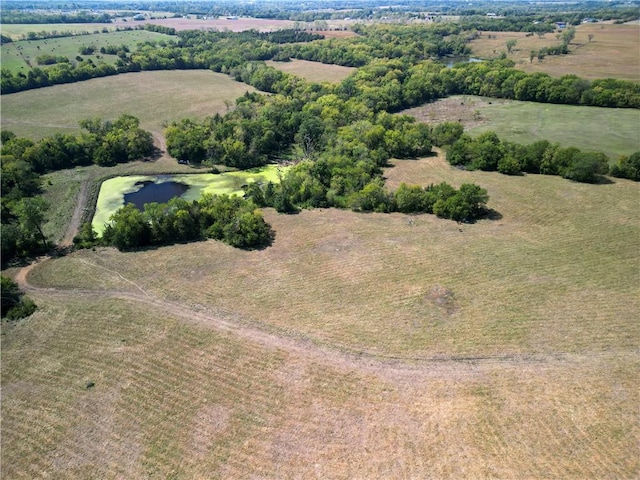 aerial view featuring a rural view and a water view