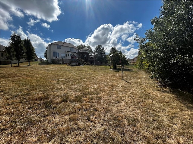 view of yard with a deck