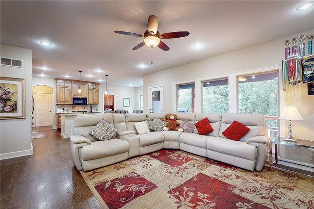 4602 NW Verona Dr, Riverside, MO 64150 - living area featuring a ceiling fan, dark wood-type flooring, recessed lighting, and baseboards