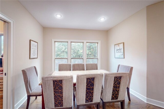 4602 NW Verona Dr, Riverside, MO 64150 - dining space with wood finished floors, baseboards, and recessed lighting