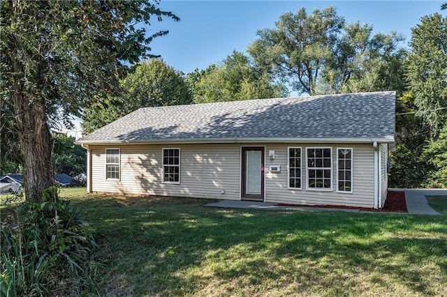 ranch-style house with a front lawn