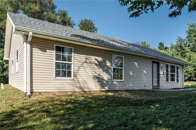 exterior space with a lawn