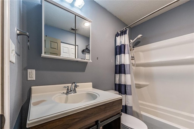 full bath with visible vents, toilet, shower / bath combo, a textured ceiling, and vanity