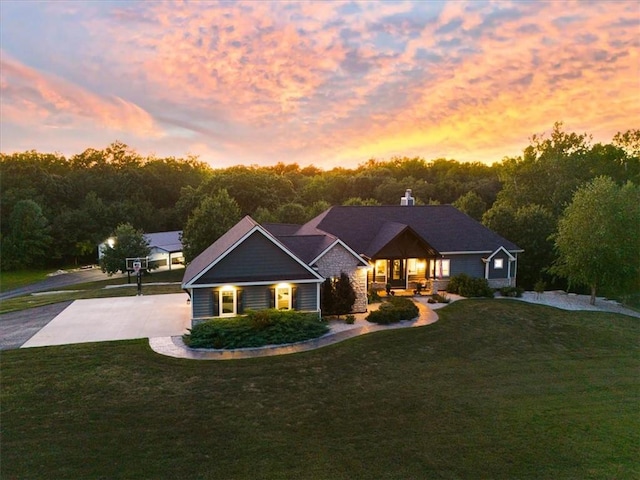 craftsman-style house with a lawn