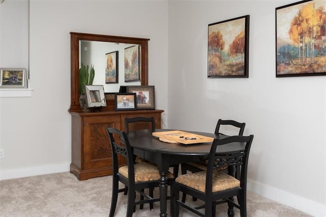 view of carpeted dining room