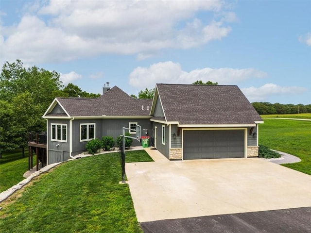 ranch-style home with a garage, a wooden deck, and a front yard