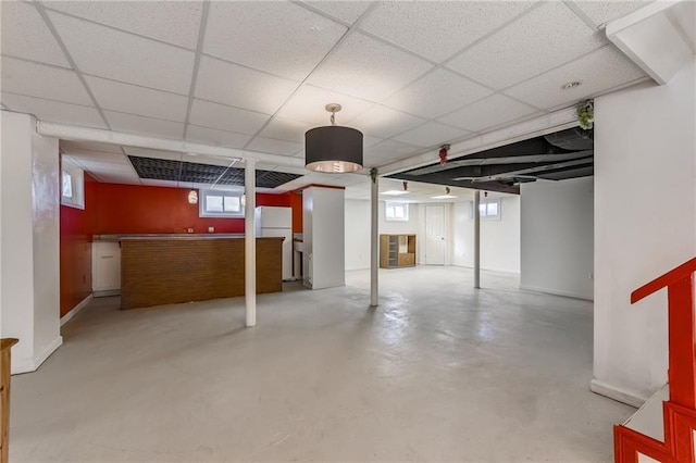 basement with a drop ceiling