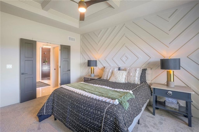 bedroom featuring carpet floors, beamed ceiling, ornamental molding, and ceiling fan