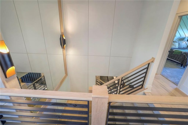 stairway with wood-type flooring