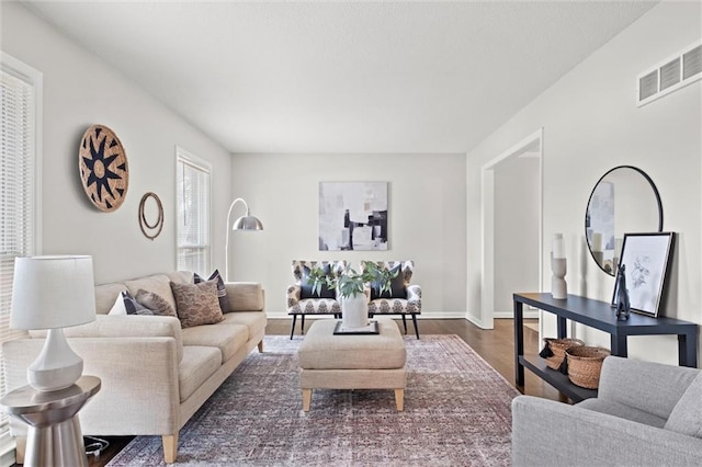 living room featuring dark hardwood / wood-style floors