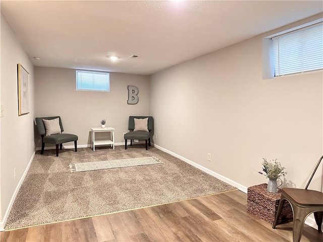 living area featuring hardwood / wood-style floors