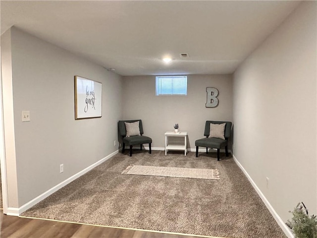 living area with wood-type flooring