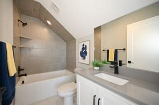 full bathroom with toilet, vaulted ceiling, tub / shower combination, and vanity