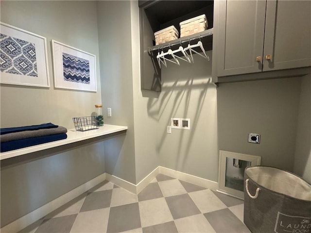 12850 N Arbor Way, Platte City, MO 64079 - laundry room with electric dryer hookup, cabinet space, washer hookup, and light flooring