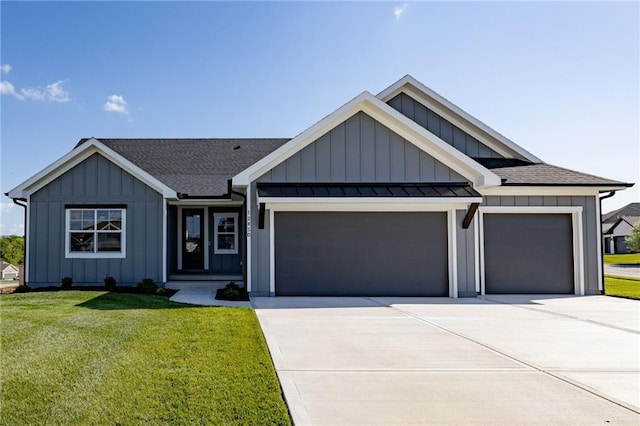 12850 N Arbor Way, Platte City, MO 64079 - view of front facade with board and batten siding, a garage, and concrete driveway