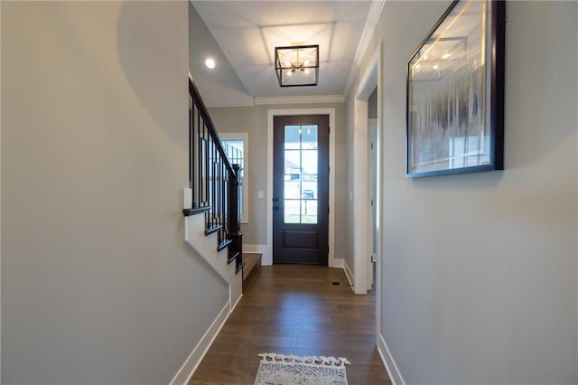 12850 N Arbor Way, Platte City, MO 64079 - doorway to outside with dark wood-style flooring, stairway, a chandelier, and ornamental molding