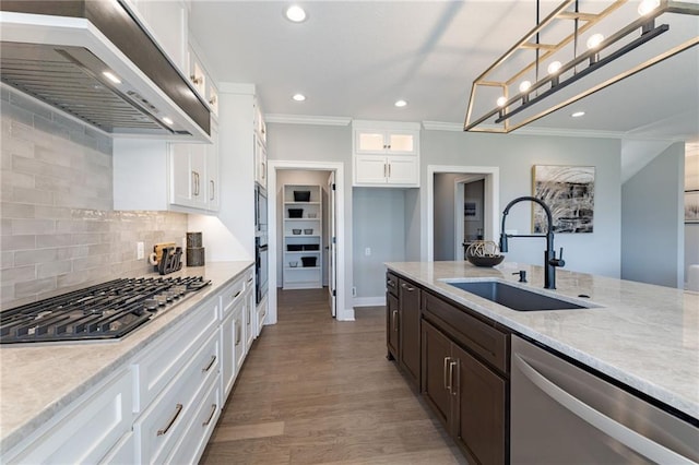 12850 N Arbor Way, Platte City, MO 64079 - kitchen with exhaust hood, appliances with stainless steel finishes, glass insert cabinets, light stone countertops, and tasteful backsplash