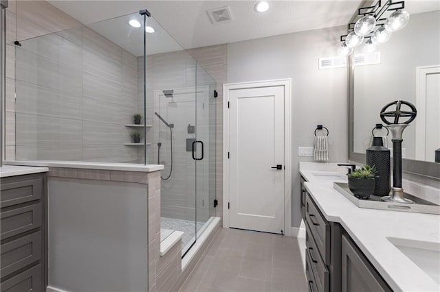 12850 N Arbor Way, Platte City, MO 64079 - full bathroom featuring a stall shower, double vanity, tile patterned flooring, and recessed lighting