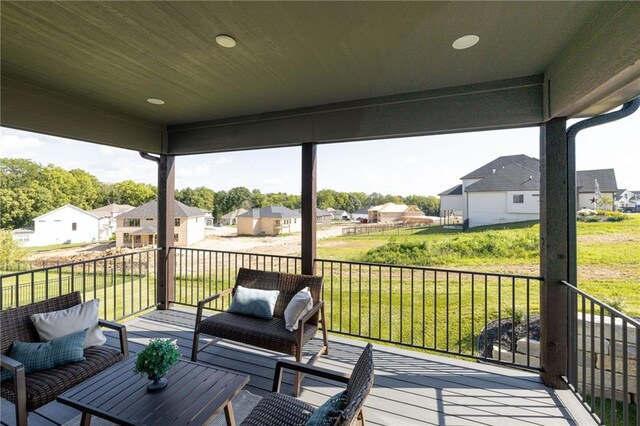 12850 N Arbor Way, Platte City, MO 64079 - wooden deck featuring a residential view and a lawn
