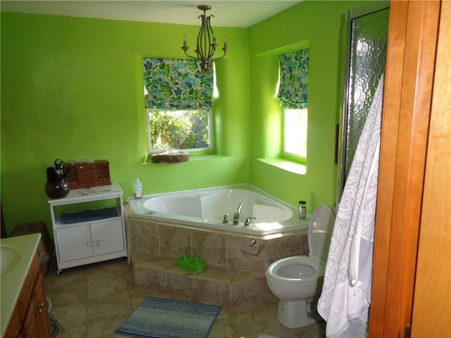 bathroom featuring toilet, tile patterned flooring, an enclosed shower, vanity, and a bath