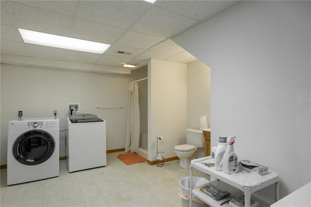 laundry room with washer and clothes dryer