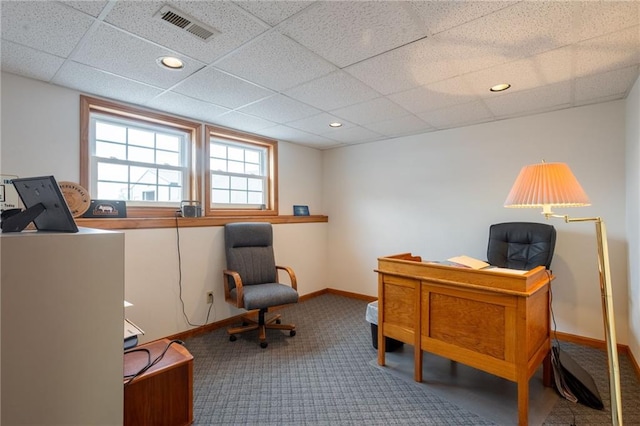 office area featuring carpet floors and a paneled ceiling