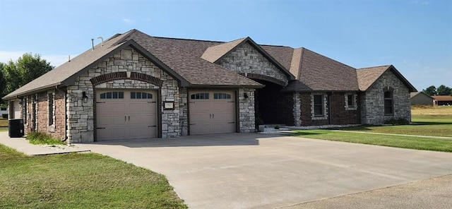 french country inspired facade featuring a garage and a front yard