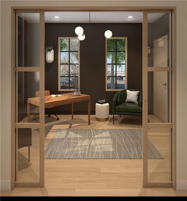 office space with hardwood / wood-style floors