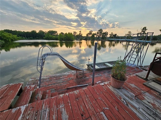 dock area with a water view