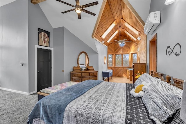 bedroom featuring carpet, a skylight, high vaulted ceiling, a wall mounted air conditioner, and baseboards