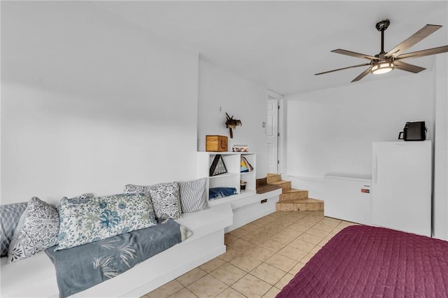 tiled living room featuring stairway and a ceiling fan