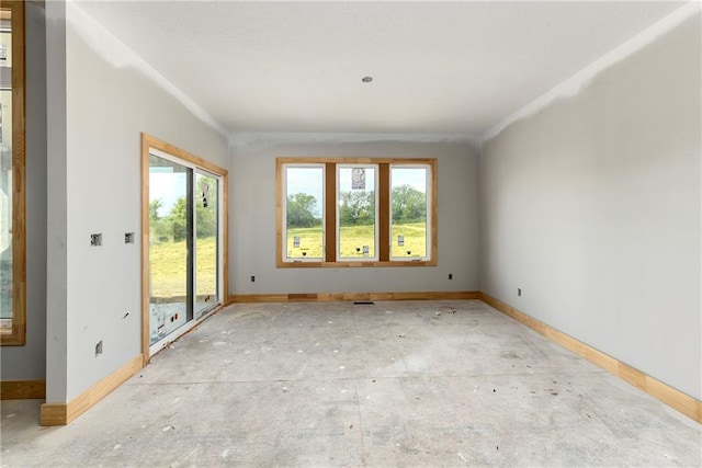 spare room featuring plenty of natural light