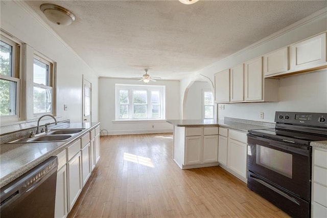 kitchen with black range with electric stovetop, white cabinets, sink, dishwasher, and light wood-type flooring