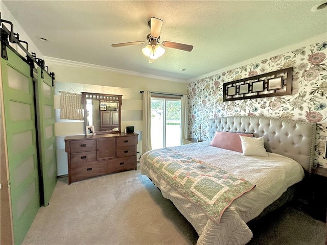 bedroom featuring a textured ceiling, access to outside, light carpet, ornamental molding, and ceiling fan