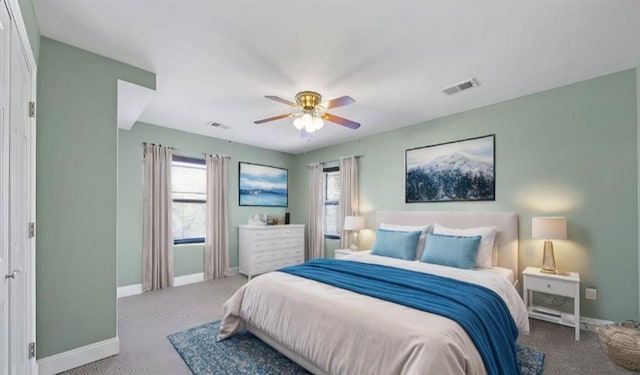 carpeted bedroom featuring ceiling fan