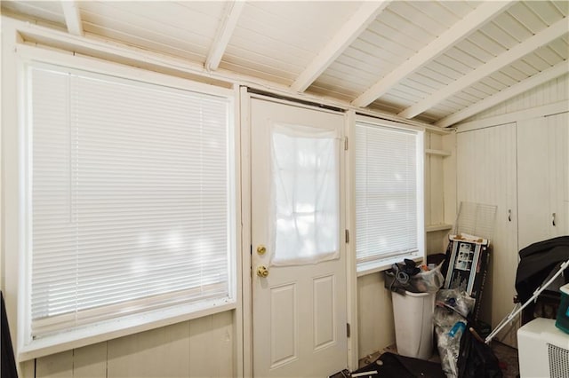 entryway featuring wood ceiling and vaulted ceiling with beams