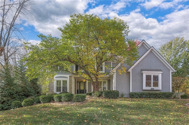 view of front facade with a front yard