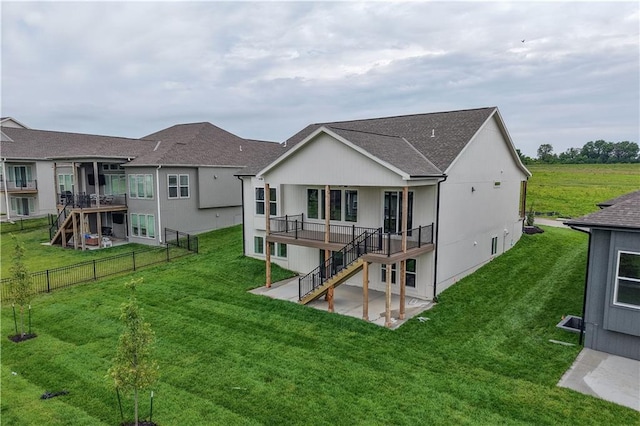 1617 SW Arbor Park Dr, Lees Summit, MO 64082 - back of property featuring a patio, stairs, a wooden deck, and roof with shingles