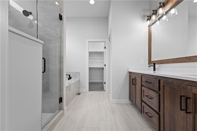 1617 SW Arbor Park Dr, Lees Summit, MO 64082 - bathroom with a stall shower, double vanity, a spacious closet, and a bath