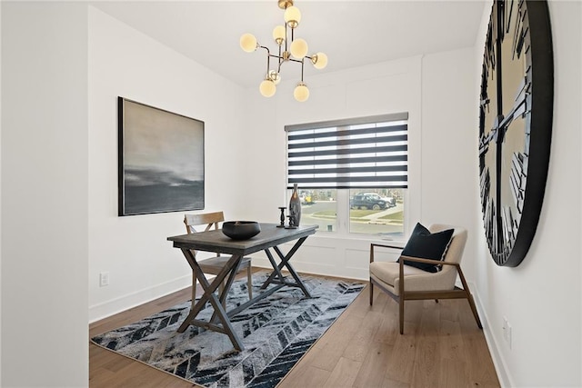 office area featuring hardwood / wood-style flooring and a notable chandelier