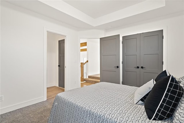 bedroom with a closet and carpet flooring