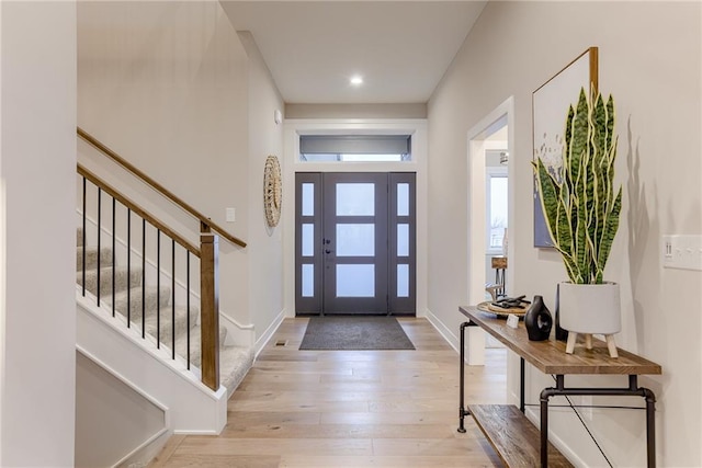 foyer with light hardwood / wood-style flooring