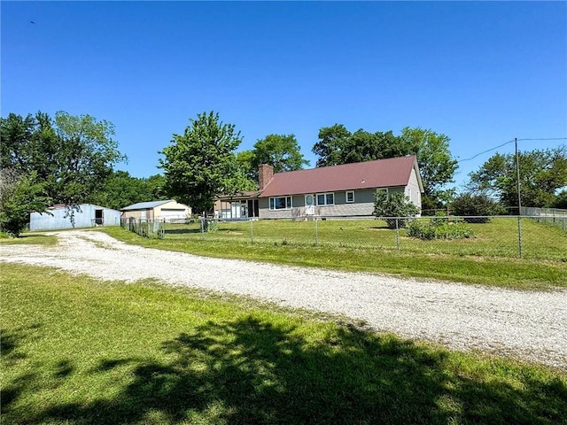 10784 SW 70th St, Chetopa, KS 67336 - view of front of house with a chimney and metal roof