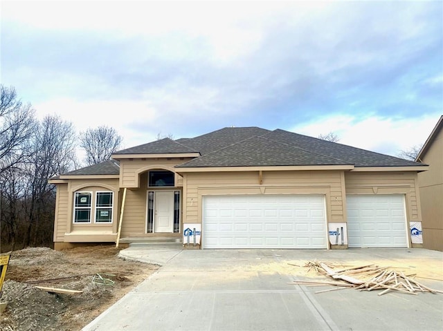 view of front of home with a garage