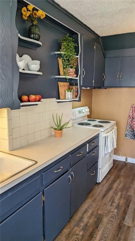 kitchen featuring blue cabinetry, white electric range oven, dark hardwood / wood-style flooring, and a textured ceiling