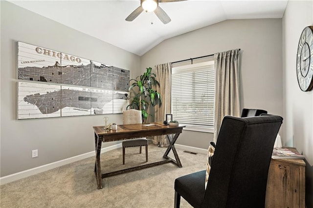 carpeted office space featuring ceiling fan and lofted ceiling