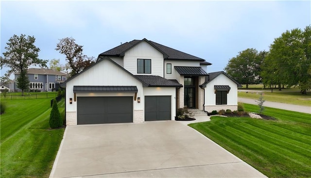 modern farmhouse featuring a front yard and a garage