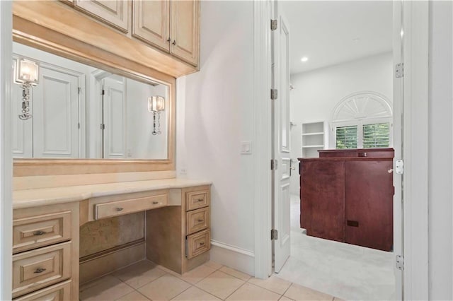 bathroom featuring vanity and tile patterned flooring