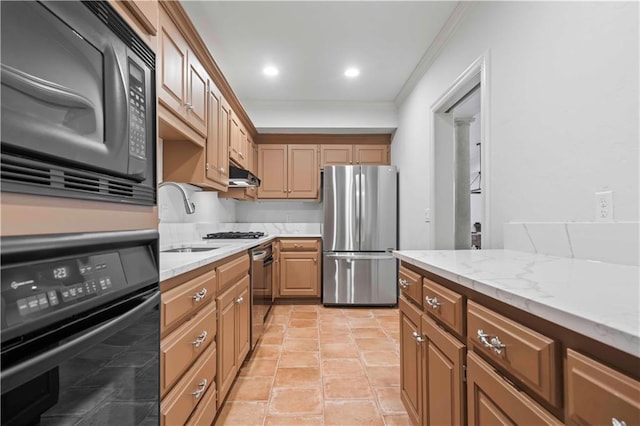 kitchen featuring light stone counters, black appliances, sink, crown molding, and light tile patterned floors